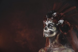 Young girl in the image of Santa Muerte